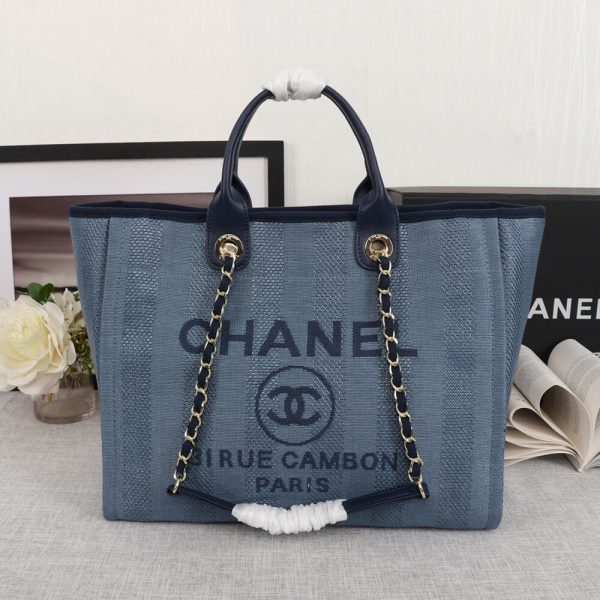 Ch*el woven straw raffia striped medium deauville tote