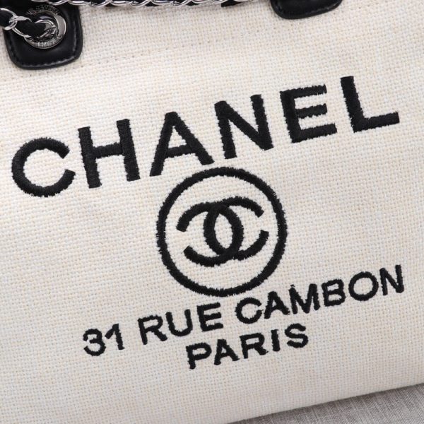 Ch*el woven straw raffia striped medium deauville tote