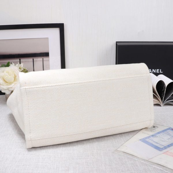 Ch*el woven straw raffia striped medium deauville tote