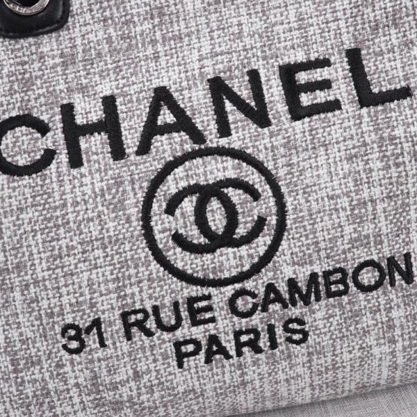 Ch*el woven straw raffia striped medium deauville tote